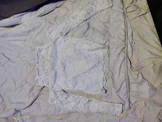 White shoulder cut out shirt