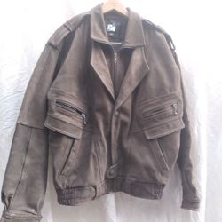 Vintage 80's Cuero Legitimo Brown Nubuck Leather Biker Jacket XXL Women's 

Biker riding jacket. Could be also used a casual night party jacket.