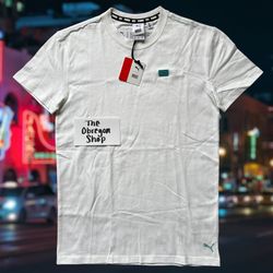 PUMA TMC NIPSEY HUSSLE HUSTLE WAY TEE SHIRT MENS SIZE SMALL WHITE BLUE NEW