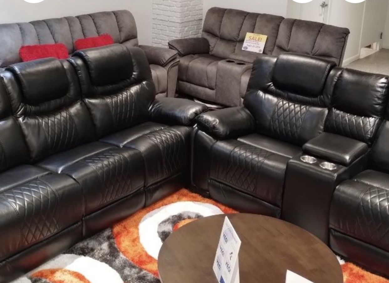 BLACK OR BROWN RECLINING SOFA AND LOVESEAT
