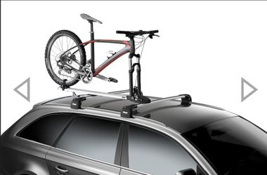 ThuleThruRide Rooftop Fork Mount Bike Carrier in good working condition