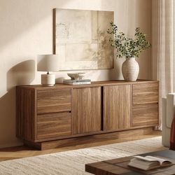 B470 $190  70'' Wide TV Stand for TVs Up to 75'', Wood Entertainment Center with Sliding Doors and Drawers, Television Console Storage Cabinet with Ad