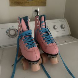 Bubble gum Pink angel skates 