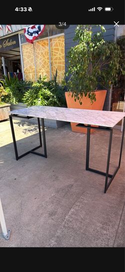 Marble top metal base table 57 wide 24 deep 30 tall