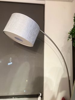 Large Arched/arc floor lamp with a linen drum shade.