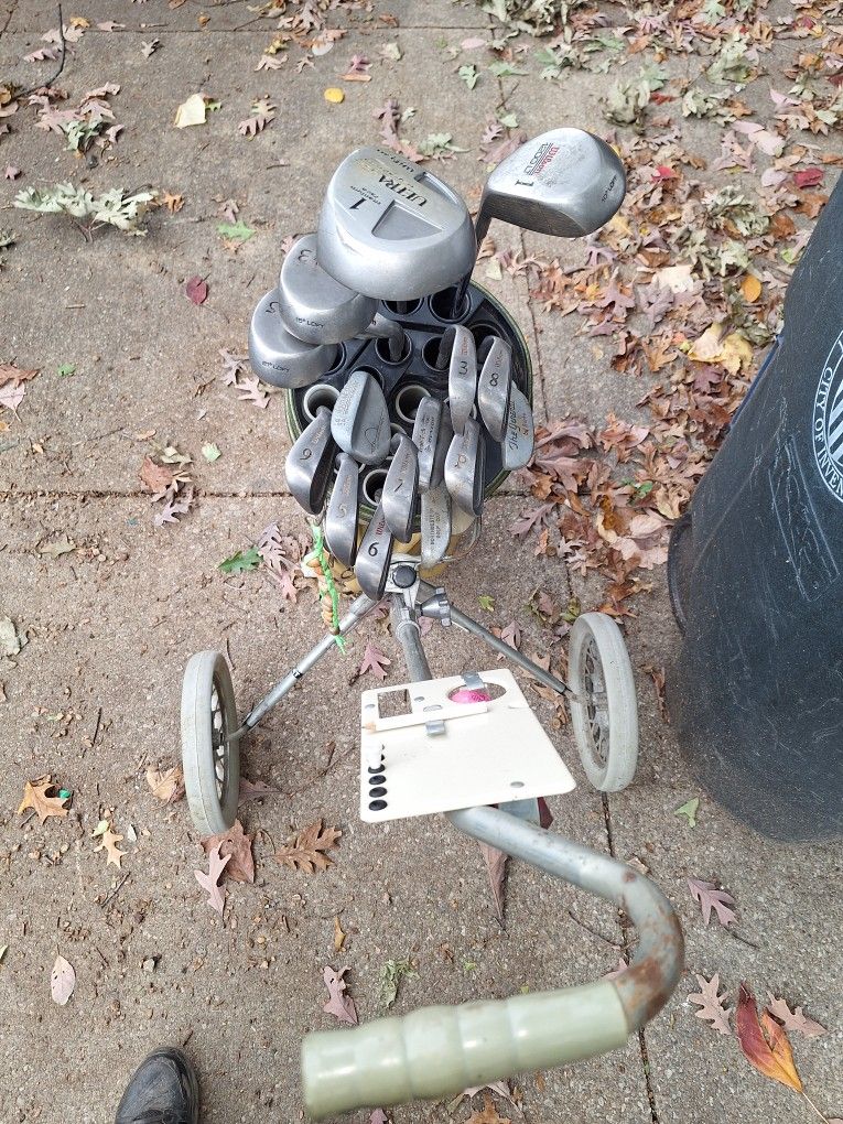 Golf Bag With Carrier  And Clubs 