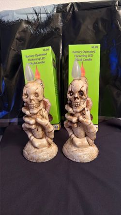 Flickering LED skull candles (set of 2)