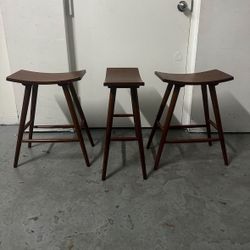 3 wooden bar stools. $25 each. h: 2 ft