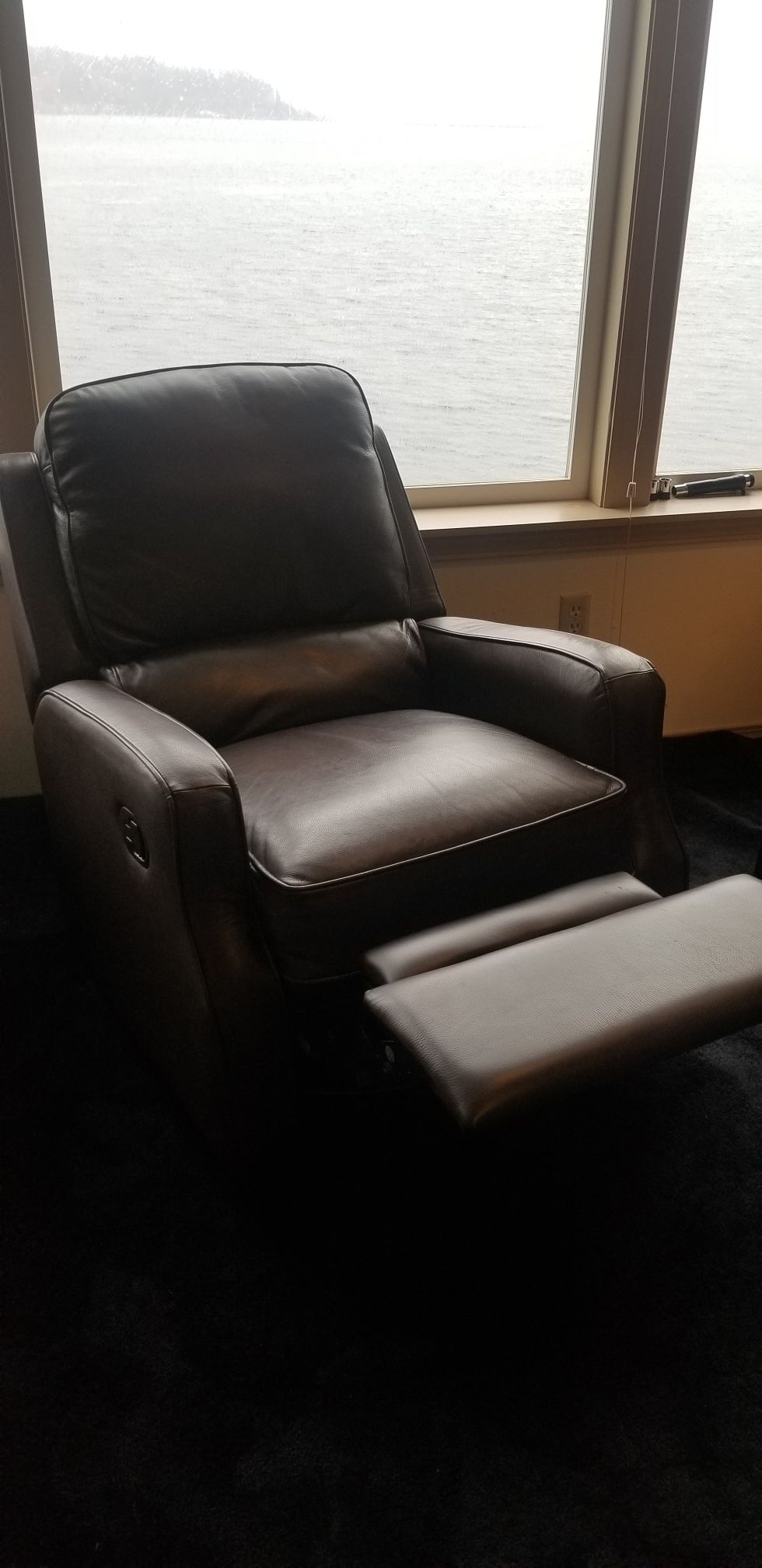 Brand new Leather Recliner with swivel and glide
