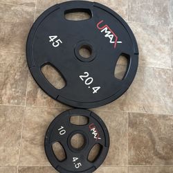 Weightlifting plates Two 45 Lbs Plates And Two 10 Lbs Plates