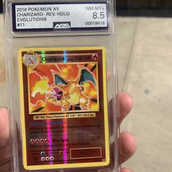2016 Pokémon XY Charizard reverse holo evolutions grade 8.5