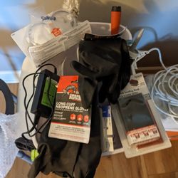 2 Igloo Coolers.  2 Pair New Rubber Gloves .Extension Cord. Other Stuff