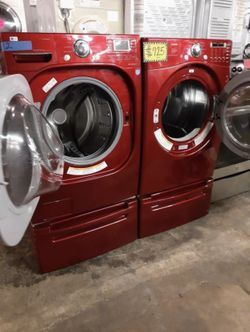 LG front load washer and electric dryer with pedestals in excellent conditions