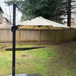 Patio Umbrella + Weighted Base + Cover – $200