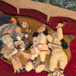 Clowns And Indian Dolls