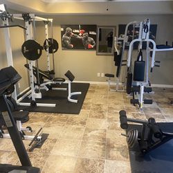Perfect Home Gym  Multi Stack - Smith - Plates and Dumbells  more- IF ITS STILL LISTED ITS AVAILABLE
