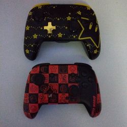 2 Nintendo Switch Pro Controllers