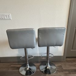 $700 for bedroom set.  $700 for couch.  $100 for tv stand. $300 for tv.  $20 for barstools.