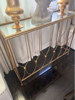 Gold and glass entry table