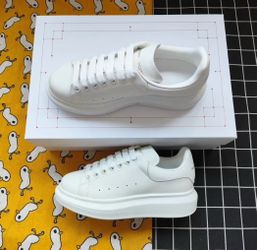 White designer shoes - $140 each
