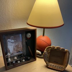 Basketball-themed accent table lamp with baseball themed picture frames
