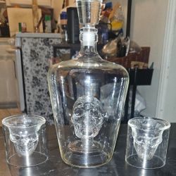 skull decanter set.