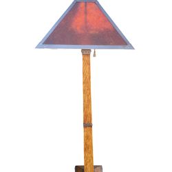 Arts and Crafts style oak and mica floor lamp.