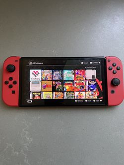 Nintendo Switch OLED Red Mario Edition With Games