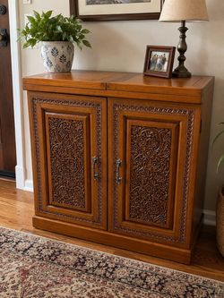 Carved  teak bar cabinet