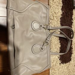 Two Authentic Tumi Handbags