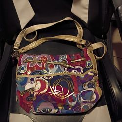 Coach Poppy drawstring Graffiti bag with long strap and and short handle