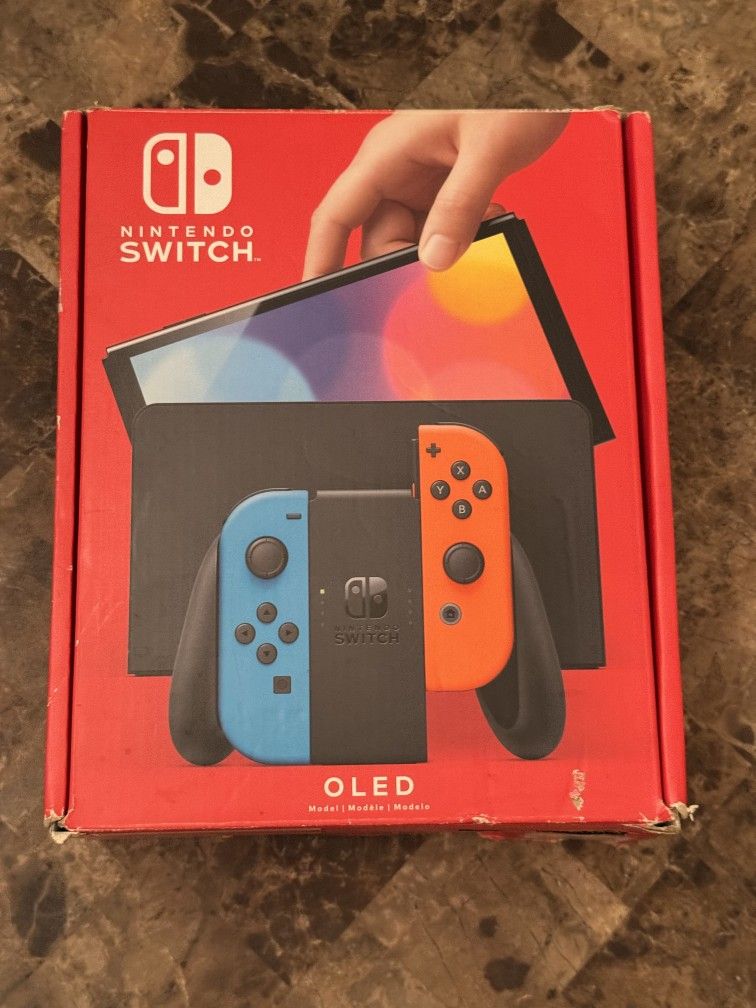 Nintendo Switch OLED - with box and Brand New Joycons controllers