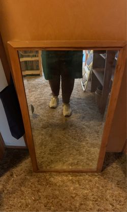 Antique mirror with solid wood frame from the early 1900s