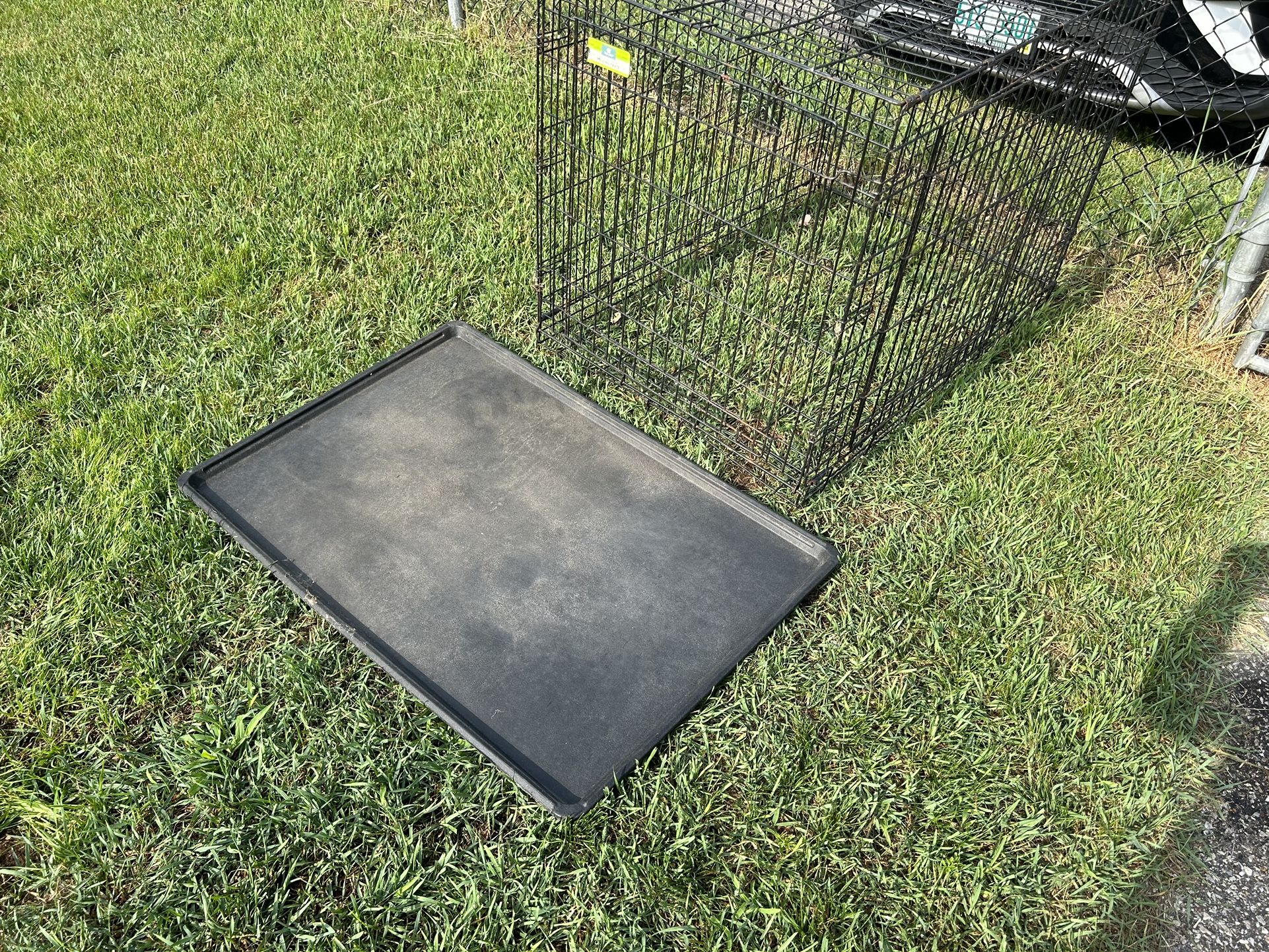 2 Large Dog Crates  And A Medium Crate 