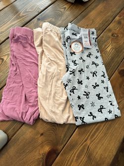 three Pairs Of Leggings, New Or Worn Once Maybe