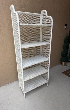 Vintage rattan shelf for garden, patio, balcony, or indoor décor. Beautiful classic piece with a white painted finish and charming vintage style. The 