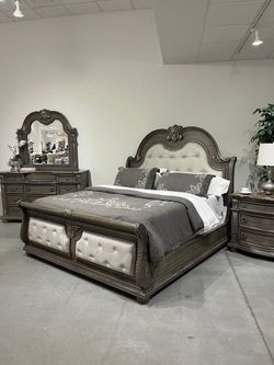 Luxurious Grandeur bedroom set features classic accenting and traditional lines