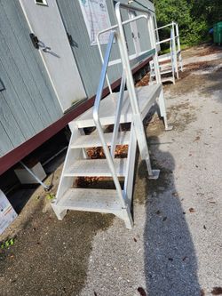 2 aluminum trailer stairs.