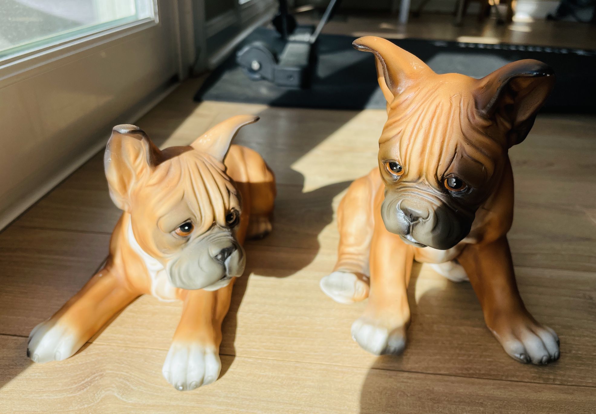 Two vintage porcelain boxer puppies
