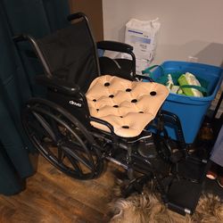 Wheelchair and inflatable pad