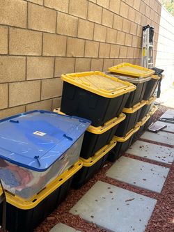 Heavy-Duty Plastic Storage full of clothes