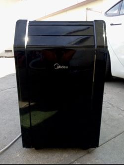 Good running air conditioner, no remote. Has the hose and the window attachment?