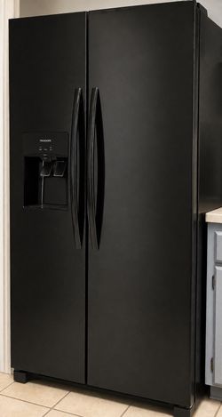 Refrigerator with water and ice dispenser