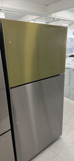 GE 21.9 cu. ft. Top Freezer Refrigerator in Fingerprint Resistant Stainless Steel, Garage Ready
