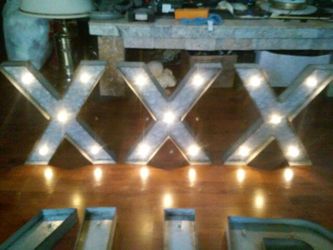 "XXX" Metal antique style lighted wall hanging sign