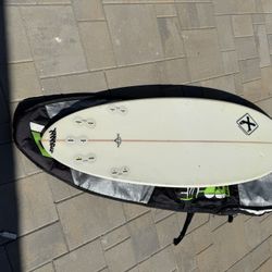 Surfboard And Bag