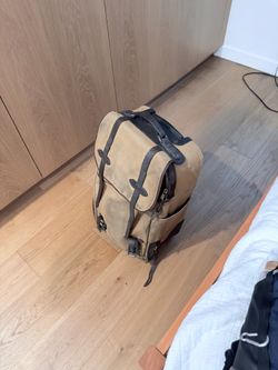 Filson rolling carry on bag