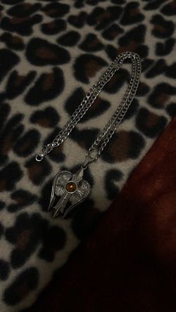 Winged Cross Pendent On Silver Chain 