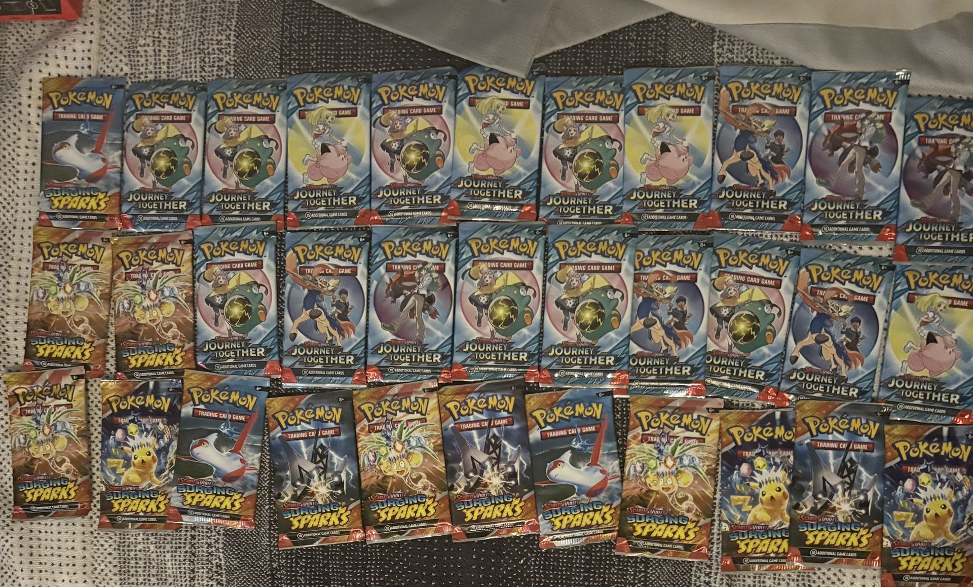 journey together and surging sparks pokemon