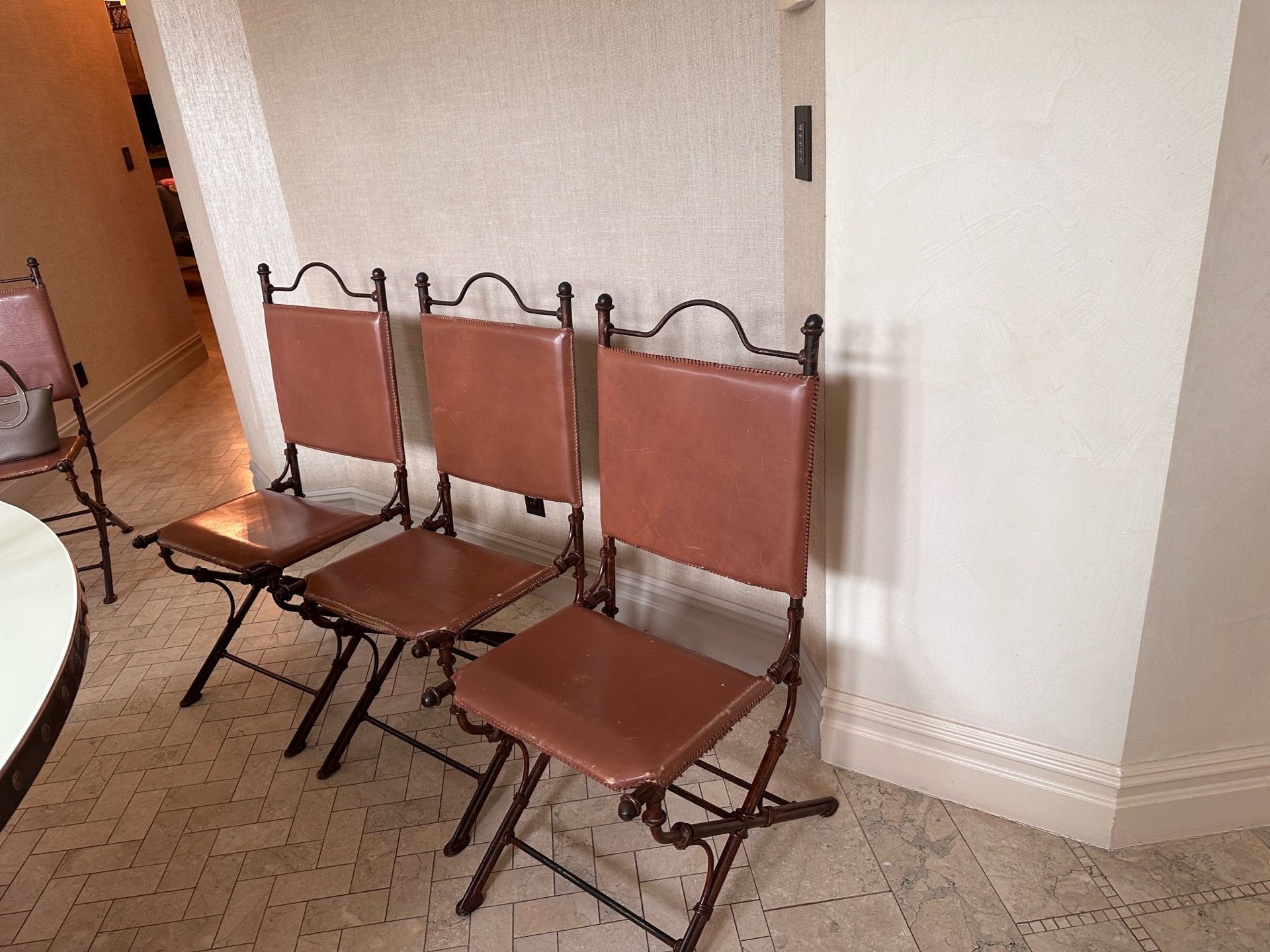 Set of 8 leather and iron chairs by ilana goor circa 1978